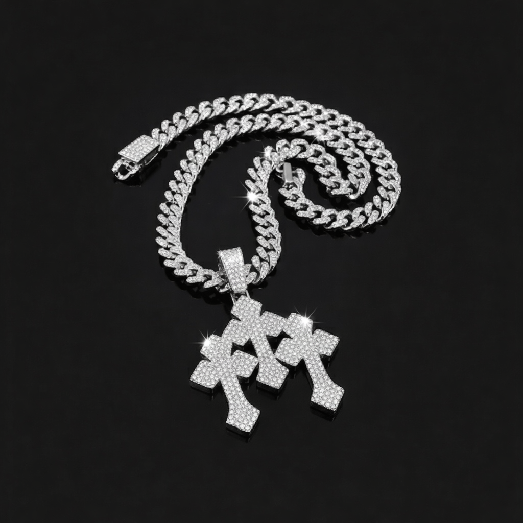 The Iced Stacked Cross Pendant – 13mm Cuban Chain features a shiny silver chain and cross pendants encrusted with small diamonds, displayed on a black background.