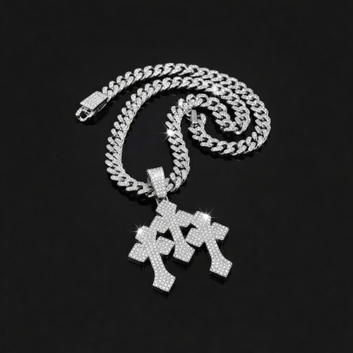The Iced Stacked Cross Pendant – 13mm Cuban Chain features a shiny silver chain and cross pendants encrusted with small diamonds, displayed on a black background.